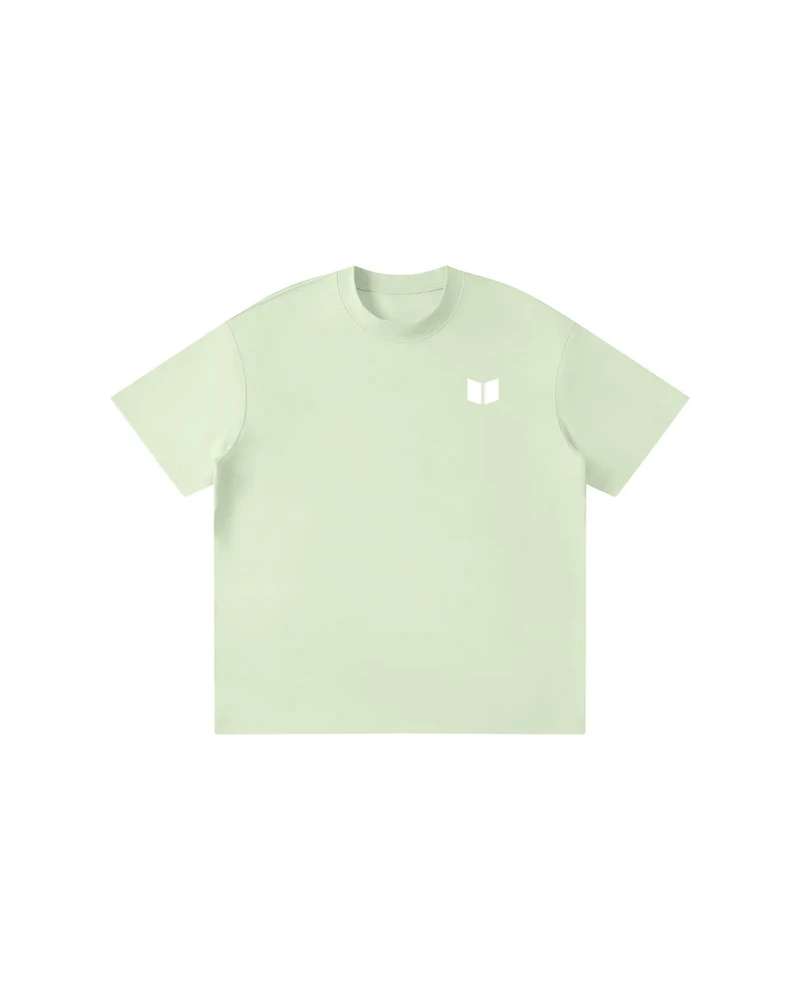 A mockup of the RAIN kids' t-shirt in green, from the front: The Transformation Edge mark, small and white, on the chest.