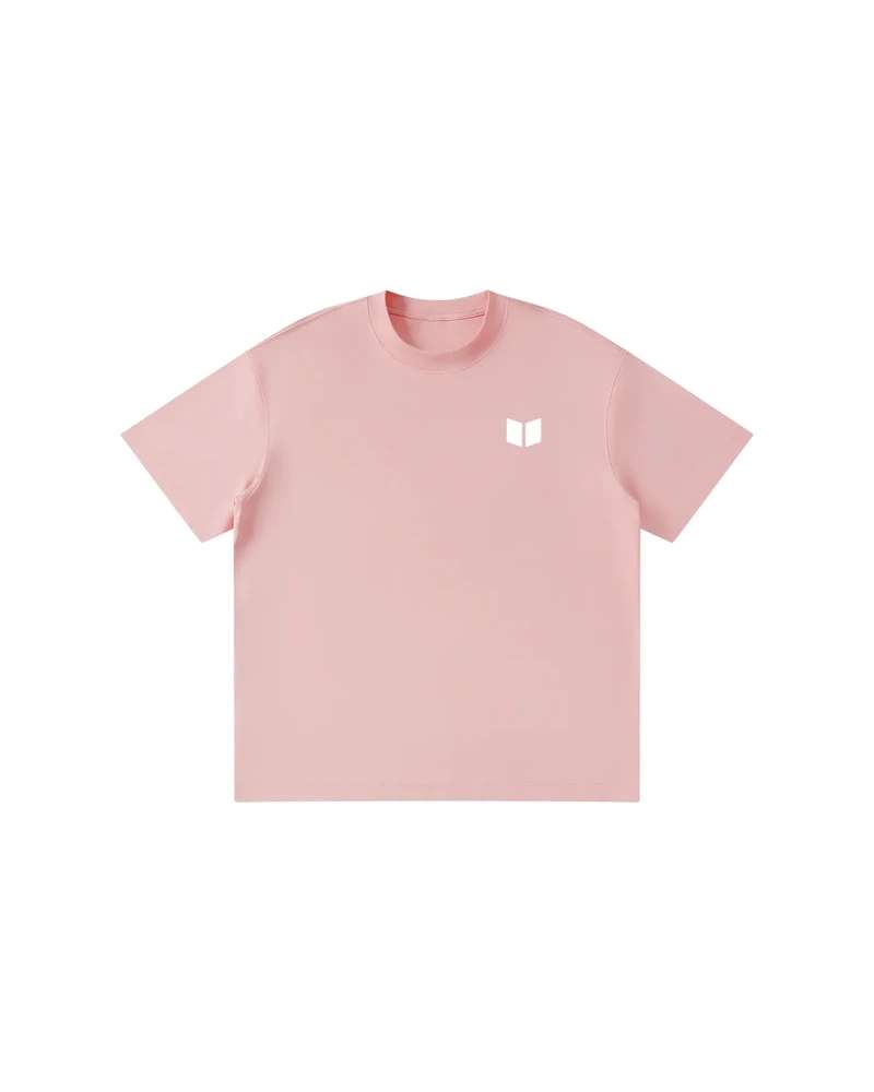 A mockup of the RAIN kids' t-shirt in pink, from the front: The Transformation Edge mark, small and white, on the chest.